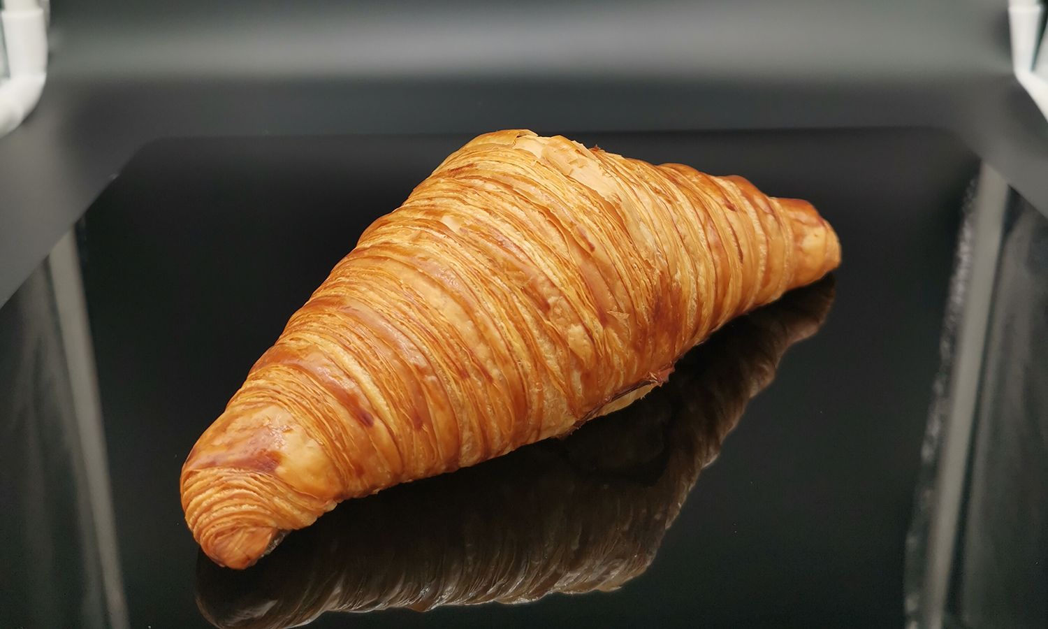 El croissant de mantega, a punt per cruspir-se'l